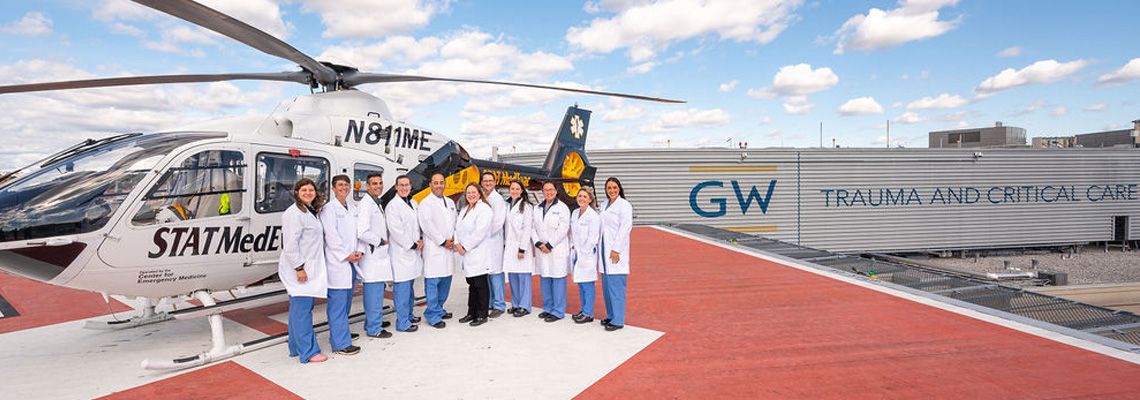 GW Trauma Center group photo with helicopter