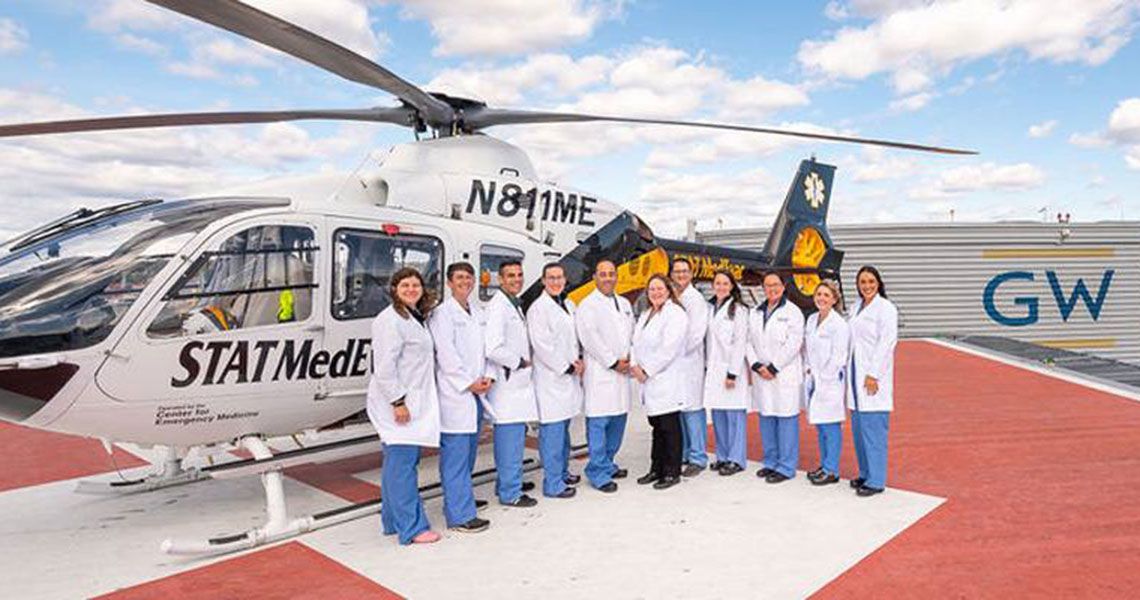 GW Trauma Center team standing together on the GW Hostpital helipad