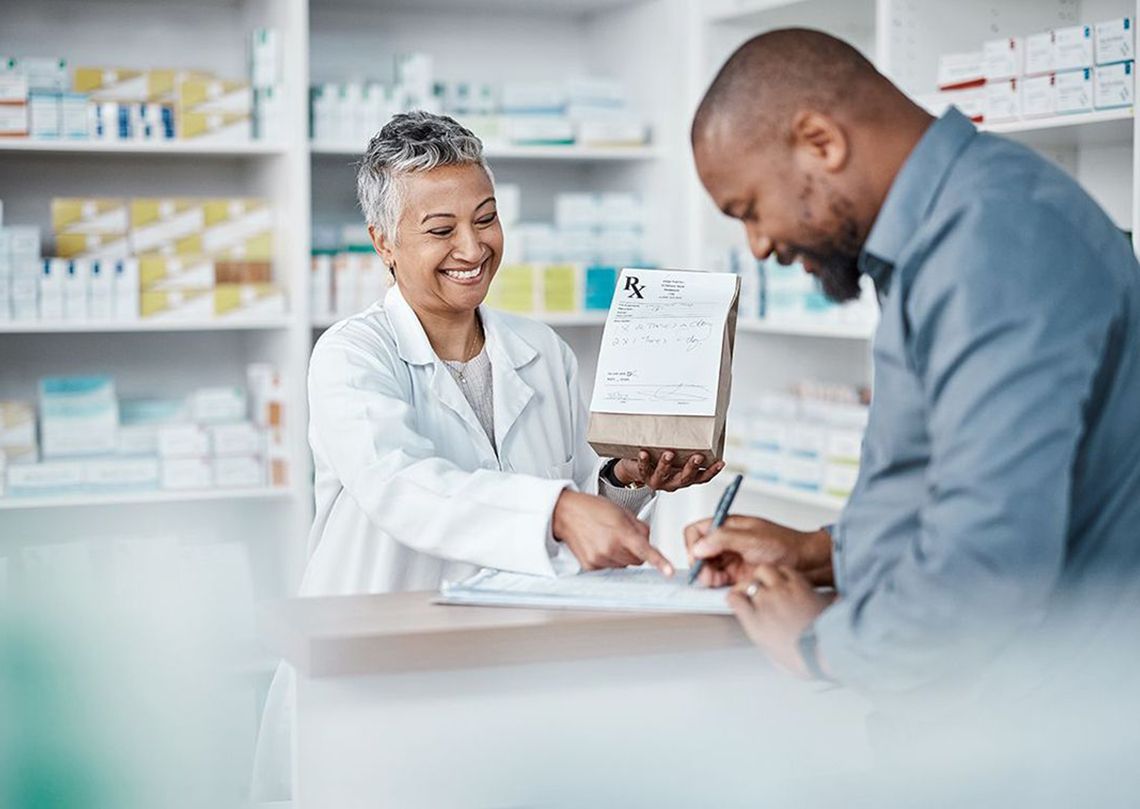 Pharmacist helping a customer
