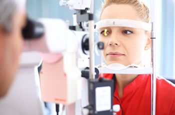woman getting eye exam